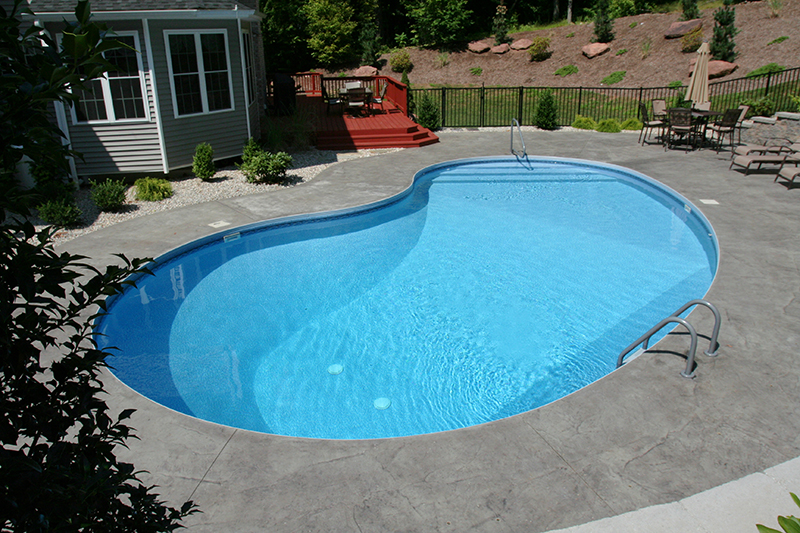 Swimming pool and stamped concrete project example 169